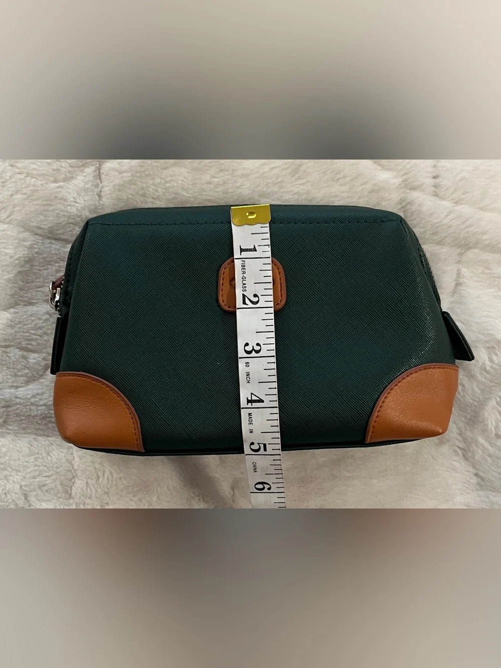 Bric's green faux-leather amenity kit bag. Unisex